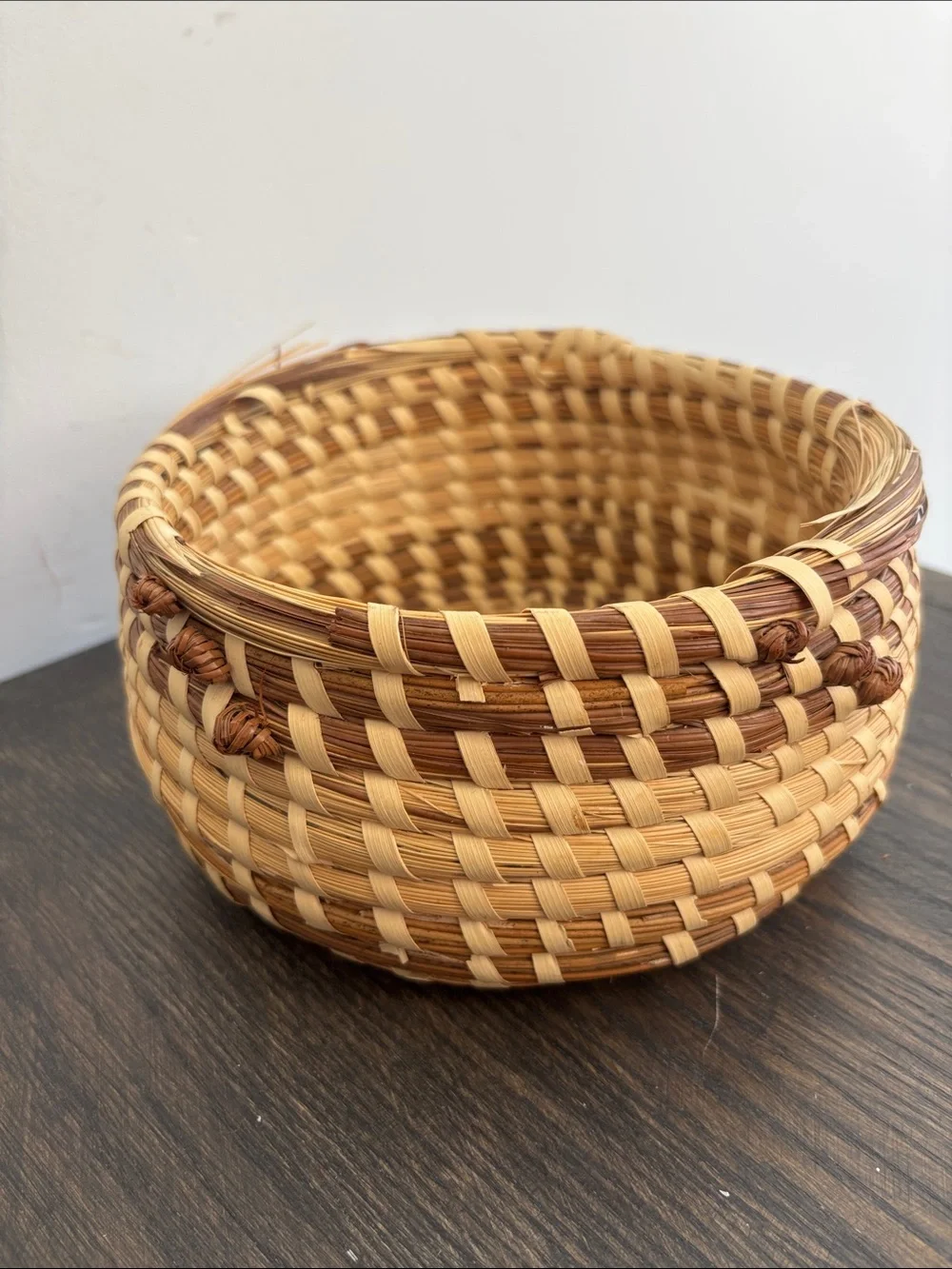 Sweetgrass handmade SC basket, round w/knots on the sides, 2 tone, 8” diameter